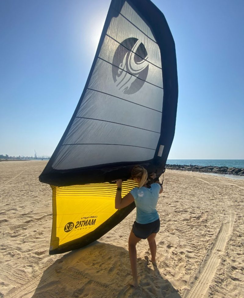 wing surfing wing tip wing tip touching the waterwater Wing foil lessons in Dubai